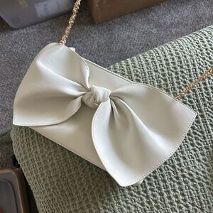 Elegant Cream Bow Accent Women's purse